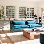 Large elegant living room with a comfortable arrangement of furniture.