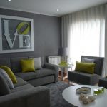 Living room in gray tones with circular arrangement of furniture