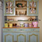 Beautiful kitchen for a country house using decoupage technique
