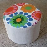 Ottoman with a cover of different fabrics
