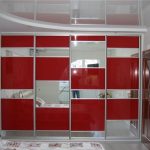 Wardrobe with red accents for doors