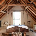 Bedroom with a loft style suspended bed