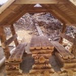 Table and benches of logs for gazebos