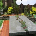 Concrete table top with flowerbed in the middle
