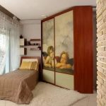 Trapezoidal corner cabinet in the small bedroom