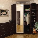 Corner wardrobe with mirror increases space