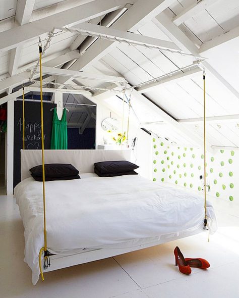 Hanging bed above the surface of the room