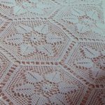 White lace elements for knitted bedspread