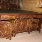 Wooden sideboard with carved elements