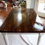 Wooden table with white legs