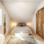 Długa wąska sypialnia ze spadzistym sufitem