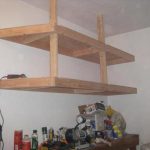 Additional hinged shelf under the ceiling