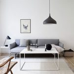 Maliit na living room na may functional na minimalism style.