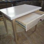 Kitchen table with a do-it-yourself drawer