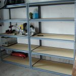 Metal shelving with plywood shelves