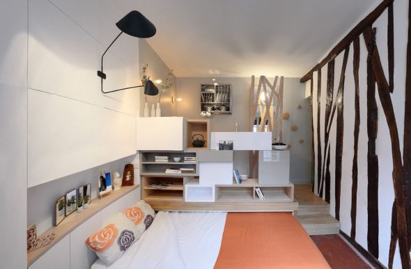 Multifunctional interior of a modern one-room apartment,