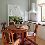 A small sliding table in a small kitchen