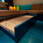Unusual solution sofa on the catwalk with an exit bed
