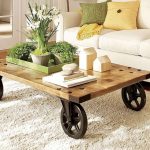 Low coffee table with big wheels