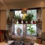 Shelf for flowers on the kitchen window