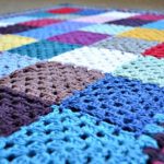 A simple blanket of leftover yarn