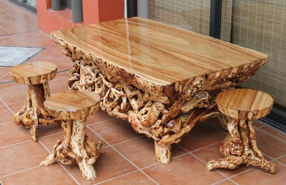 Carved table and stools