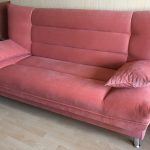 Pink sofa after replacing the upholstery on the flock