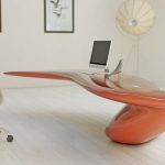 Elegancki, opływowy kształt na stół na laptopa