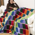 Elegant colorful handmade blanket in the interior