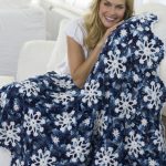 Chic blanket with snowflakes for a winter evening Chic blanket with snowflakes for a winter evening