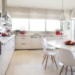Modern kitchen with white oval table