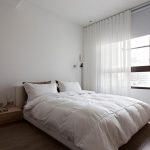 Bedroom in white in minimalism style