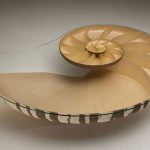 Table for eating in the form of a sea shell