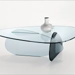 This coffee table consists of three glass plates - transparent, frosted and smoky.