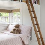Built-in baby bed in a niche
