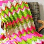 Bright zigzag for bedspread in a small chair