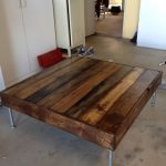Coffee table made of planks with metal legs