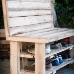 Wooden bench in country style with shelves for shoes