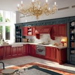 Interesting design of the kitchen in burgundy and gray tones