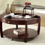 Round convertible table with a lifting mechanism