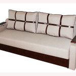 Soft sofa with cushions and armrests