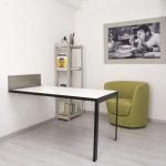 Folding table that hides on the wall