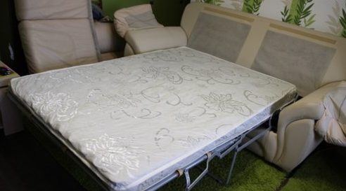 Cot with a regular mattress