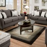 Gray sofas of the different size for a recreation area