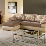 Corner sofa na may mekanismo ng dolphin sa living room