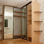 Corner wardrobe with mirrored doors