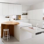 Built-in pull-out furniture in the white kitchen