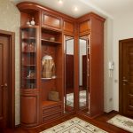 Closed and open compartments in the corner cabinet