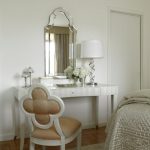 White dressing table and chair with an unusual back
