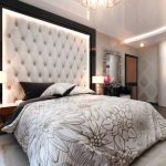Large headboard in four-frame carriage for a cozy bedroom